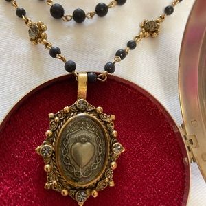 NWT. Virgins Saints Angels black heart necklace
